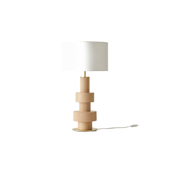 A floor lamp with a beige ceramic base and a white fabric lampshade.