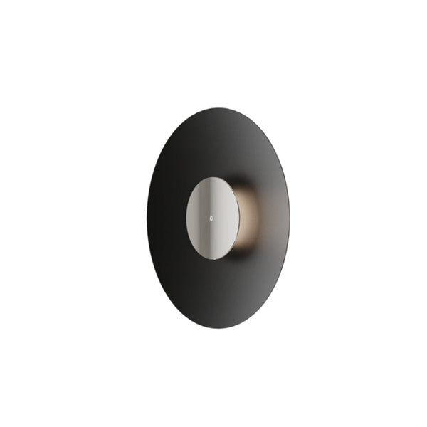 Modern wall light fixture with black and white design on a white background