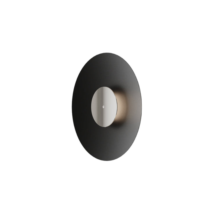 Modern wall light fixture with black and white design on a white background