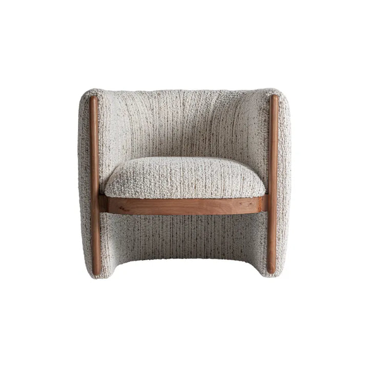 Armrest detail of Erbach Armchair highlighting curved wood and fabric seam. Only at Bazar Mondiale high end furniture and exclusive pieces.