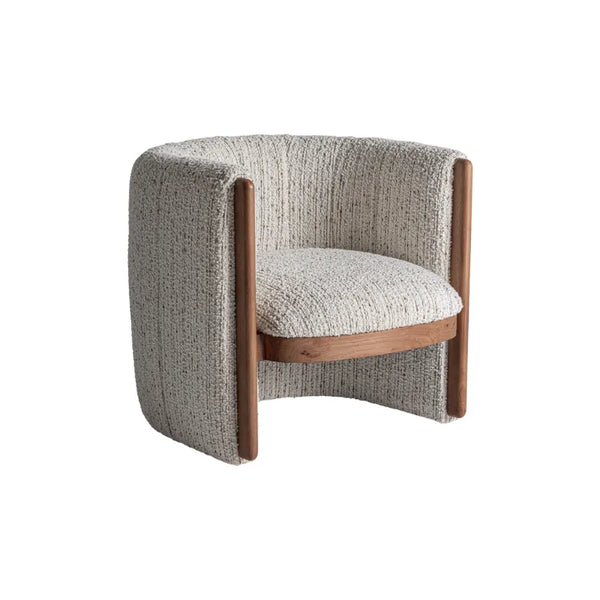 Close-up of Erbach Armchair showing beige speckled seat and natural pine grain. Only at Bazar Mondiale high end furniture and exclusive pieces.