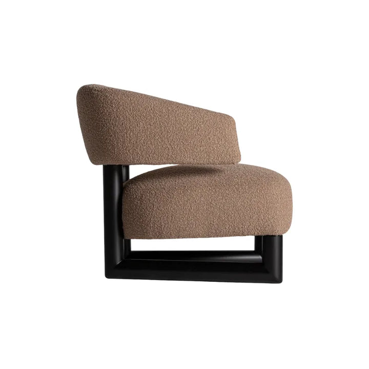 Armrest detail of Irvin Armchair in earthy brown fabric