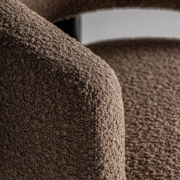 Front-facing image of Irvin Armchair showcasing geometric silhouette