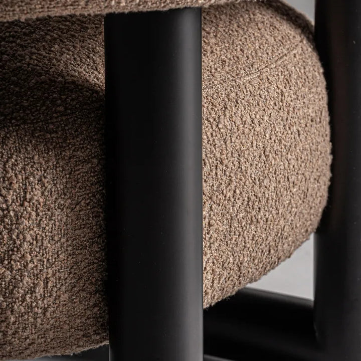 Three-quarter view of Irvin Armchair highlighting sculptural interplay