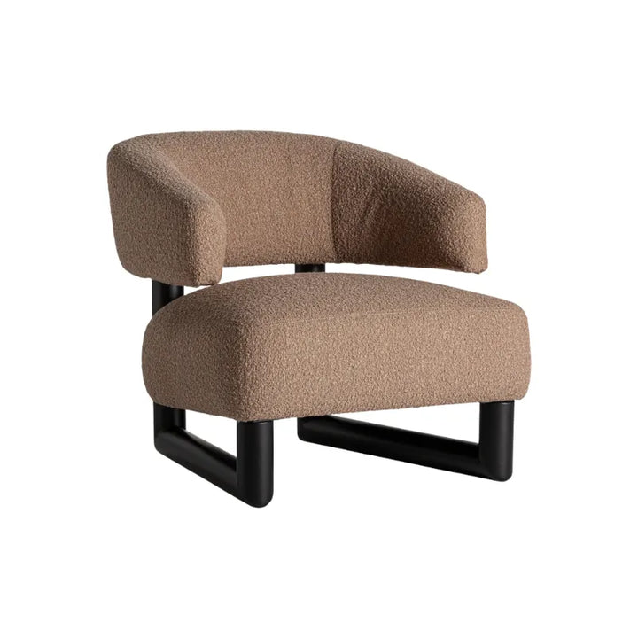 Irvin Armchair back view showing brown bouclé upholstery and matte black base