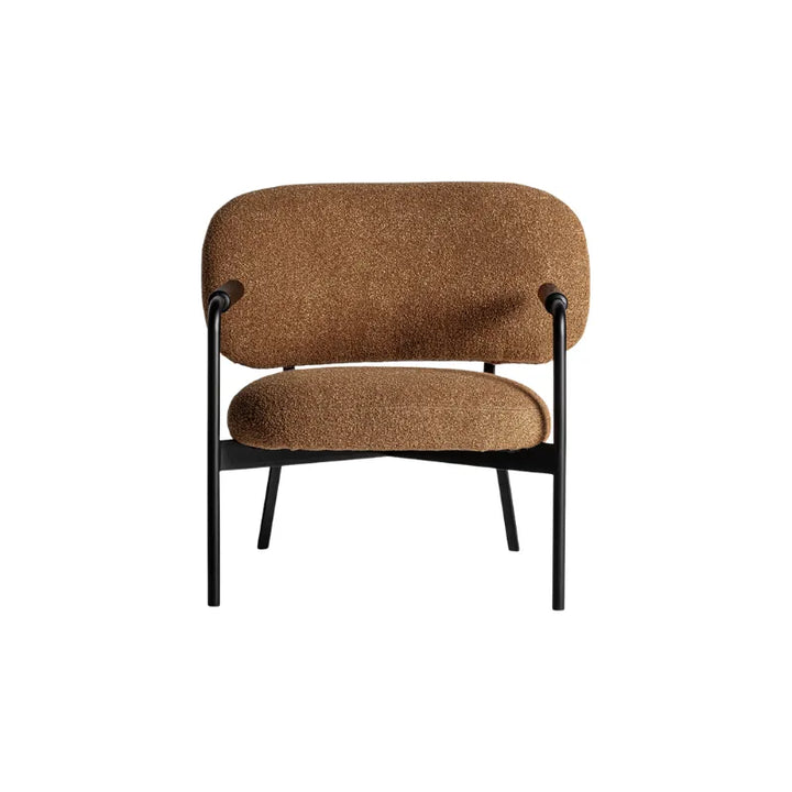 Ash wood accent on Jessie Armchair's black steel frame over warm upholstery. Only at Bazar Mondiale high end furniture and exclusive pieces.