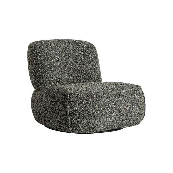 Front view of Ken Armchair in speckled green bouclé with soft rounded shape. Only at Bazar Mondiale high end furniture and exclusive pieces.