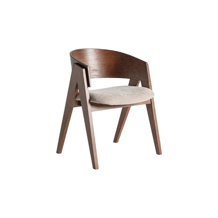 Front view of the Madiran chair with solid brown oak frame and beige cushion – Only at Bazar Mondiale high end furniture and exclusive pieces.