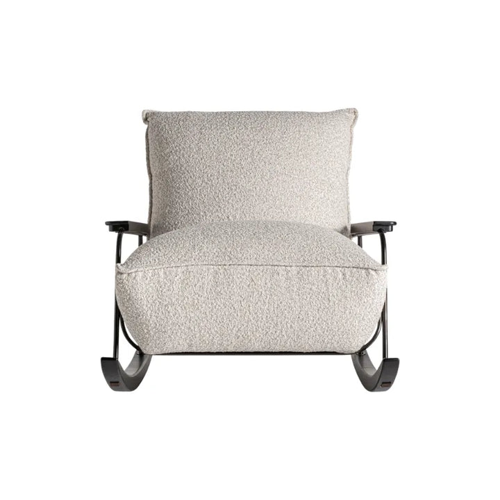 Rear view of Zw Rocking Armchair showing soft backrest and curved frame. Only at Bazar Mondiale high end furniture and exclusive pieces.