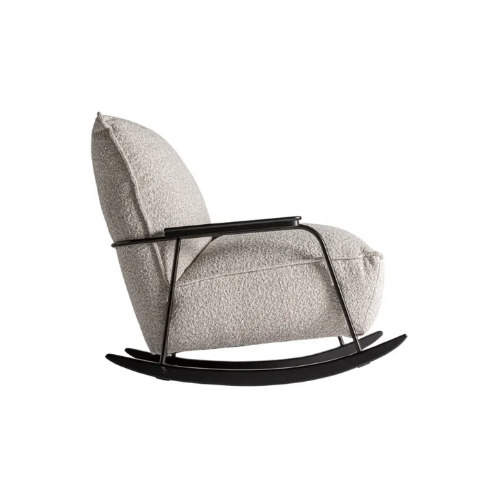 Side view of Mecedora Zw highlighting curved rockers and plush seat. Only at Bazar Mondiale high end furniture and exclusive pieces.