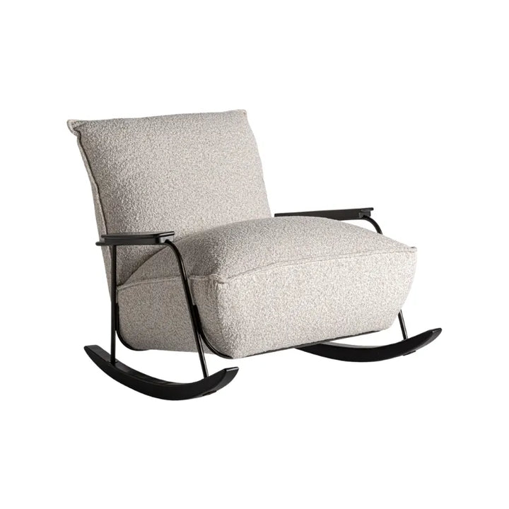 Close-up of Zw Rocking Chair armrest in black ash over beige bouclé upholstery. Only at Bazar Mondiale high end furniture and exclusive pieces.