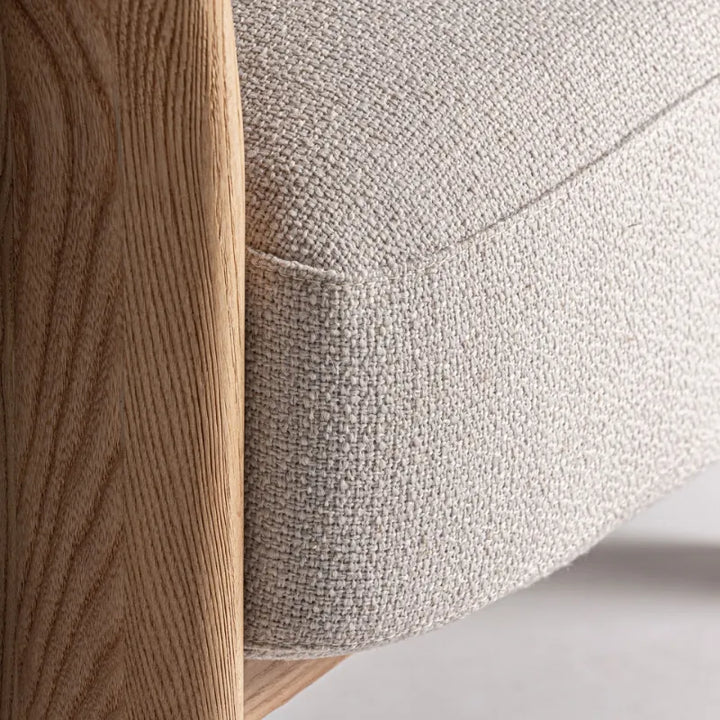 Zoomed texture of brown polyester fabric and oak joinery – Only at Bazar Mondiale high end furniture and exclusive pieces. Only at Bazar Mondiale high end furniture and exclusive pieces.