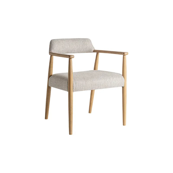 Front view of the Staple chair in light brown ash wood and beige fabric – Only at Bazar Mondiale high end furniture and exclusive pieces.