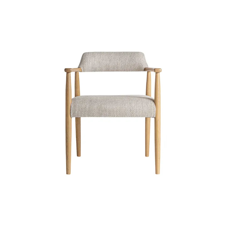 Side profile of the Staple chair highlighting its slender colonial armrests – Only at Bazar Mondiale high end furniture and exclusive pieces.