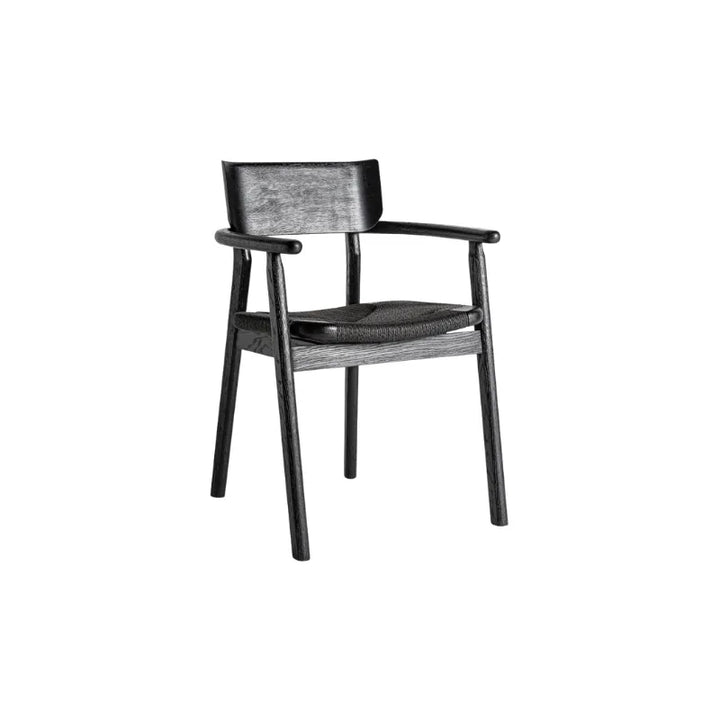 Front view of the Tasque chair in full black oak with woven rope seat – Only at Bazar Mondiale high end furniture and exclusive pieces.