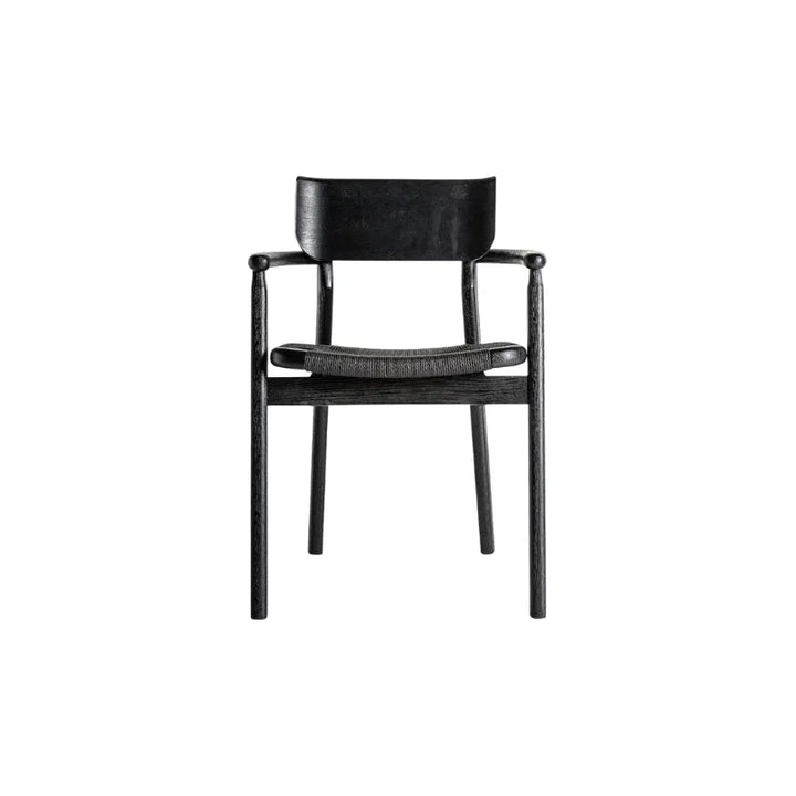 Side angle view highlighting the sculptural silhouette and arms of the Tasque chair – Only at Bazar Mondiale high end furniture and exclusive pieces.