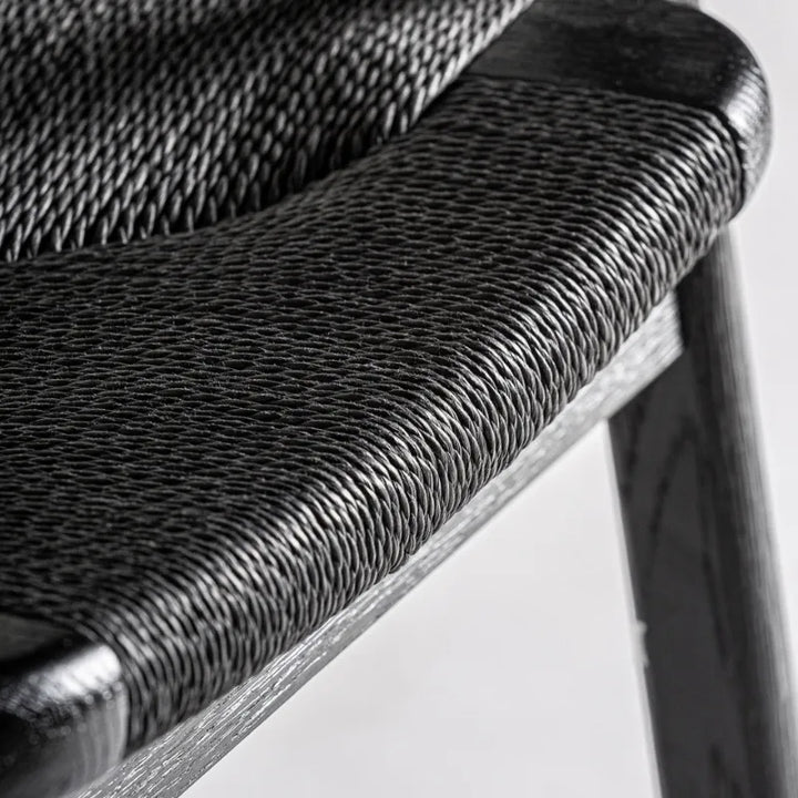 Detail close-up of the curved backrest and craftsmanship of the Tasque chair – Only at Bazar Mondiale high end furniture and exclusive pieces.