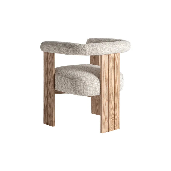 Ustka Armchair Front – Soft White Upholstered Seat and Sculpted Oak. Only at Bazar Mondiale high end furniture and exclusive pieces.